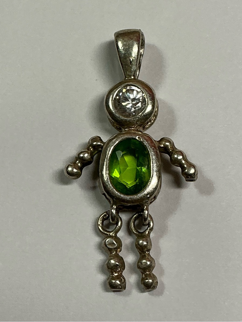 Sterling Silver Little Boy Pendant with Articulating Legs & Green Stone